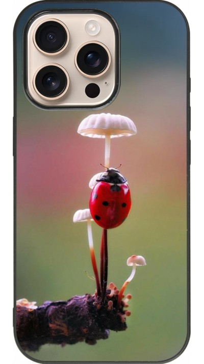 Coque iPhone 16 Pro - Silicone rigide noir Ladybird on a mushroom Spring 2026