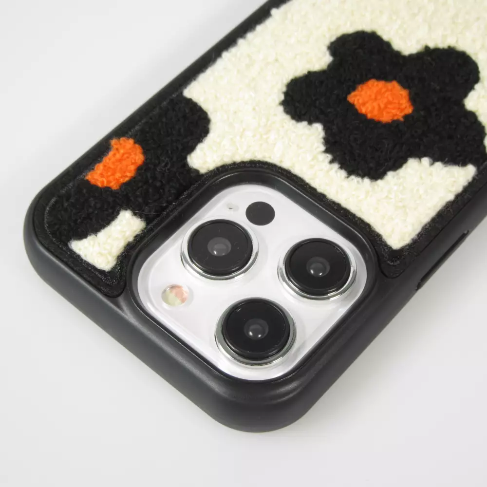 Coque iPhone 14 Pro Max - Silicone avec surface tufting effet fleur - Noir