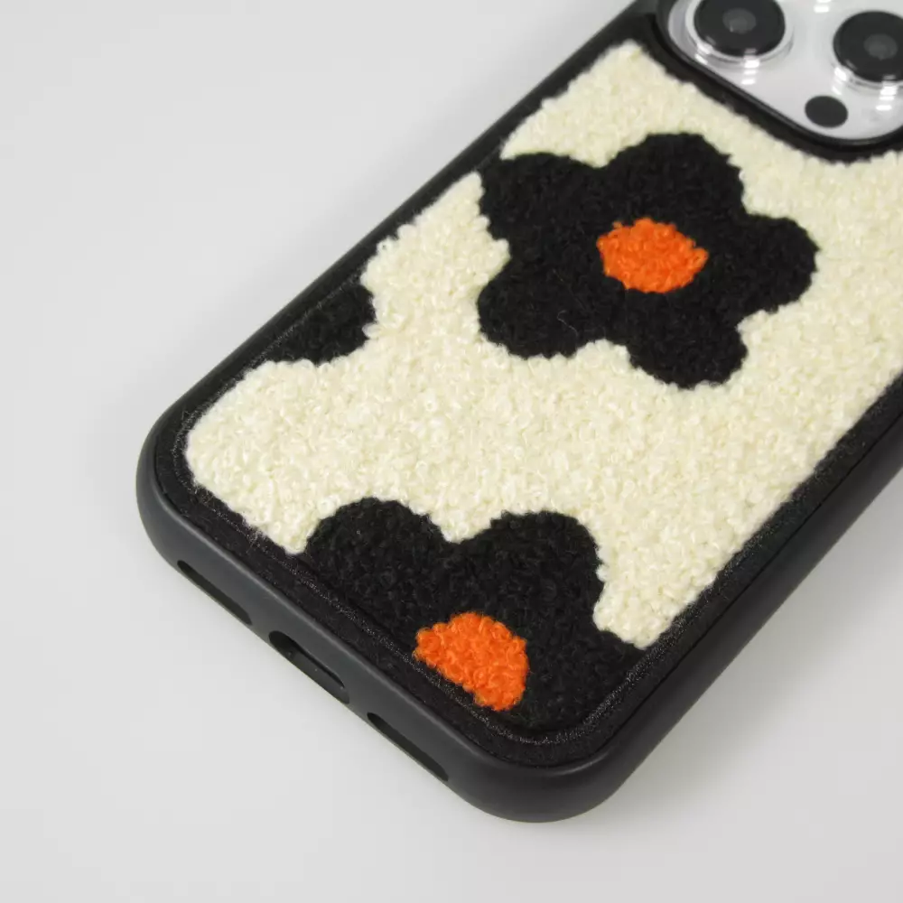 Coque iPhone 14 Pro Max - Silicone avec surface tufting effet fleur - Noir