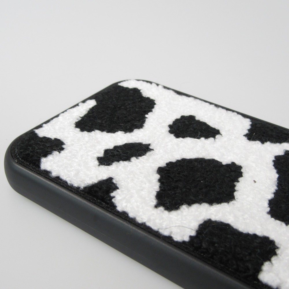 Coque iPhone 14 Pro Max - Silicone avec surface tufting effet peau de vache - Noir