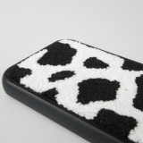 Coque iPhone 14 Pro Max - Silicone avec surface tufting effet peau de vache - Noir