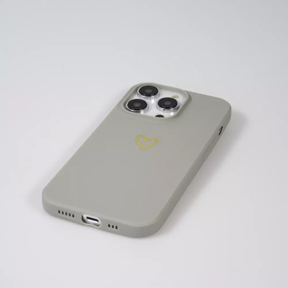 Coque iPhone 16 Pro - Silicone mat dessin cœur doré - Gris