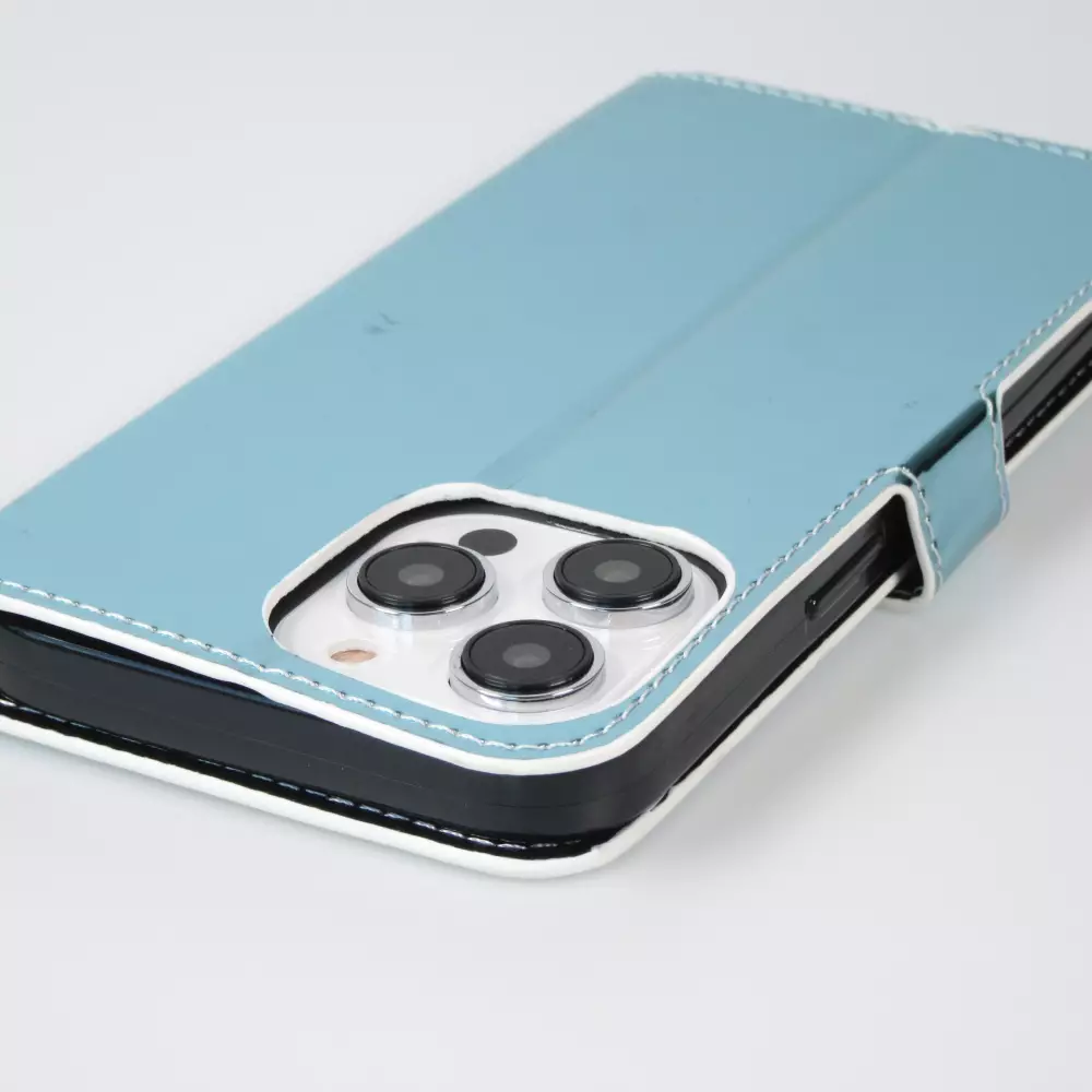 Fourre iPhone 14 Pro Max - Flip lisse brillant & réfléchissant avec dragonne - Deep Ocean